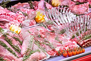 Meat department, showcase with variety of meat in different cuts
