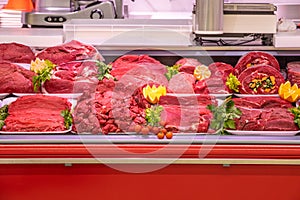 Meat department, showcase with variety of meat in different cuts