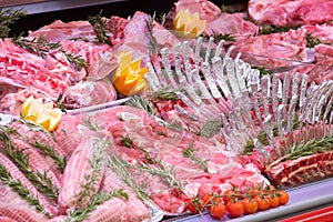 Meat department, showcase with variety of meat in different cuts