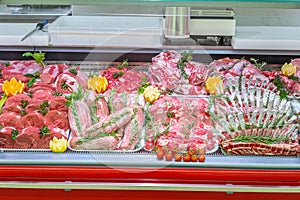 Meat department, showcase with variety of meat in different cuts