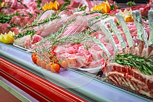 Meat department, showcase with variety of meat in different cuts