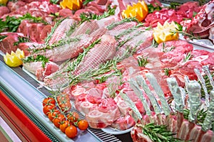 Meat department, showcase with variety of meat in different cuts