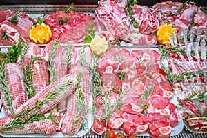 Meat department, showcase with variety of meat in different cuts