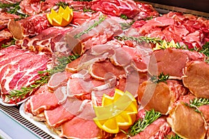 Meat department, showcase with variety of meat in different cuts