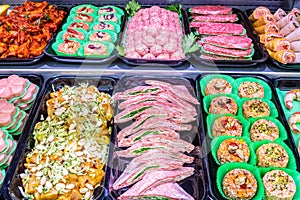 Meat department, showcase with variety of meat in different cuts