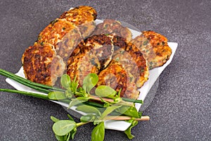 Meat dish cutlets with vegetables in white plate