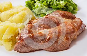 Meat fillet steak with mashed potatoes and vegetables salad