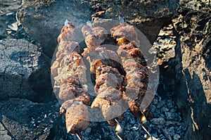 The meat is fried over an open fire