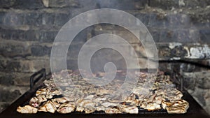 Meat Grilling On Barbecue Over The Hot Charcoals