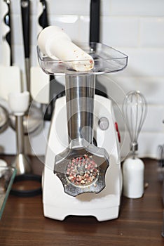 Meat grinder close up, preparation of forcemeat