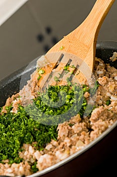 Meat grinder stir fry in a pan