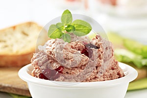 Meat and liver spread with cranberry sauce