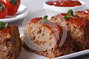 Meat Loaf Closeup sliced on a plate, horizontal
