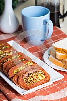 Meat loaf with fried scrambled egg with cabbage