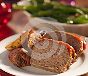 Meat loaf with roasted herb potatoes