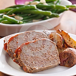 Meat loaf with roasted herb potatoes
