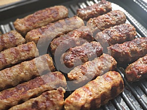 Meat pieces on electric grill