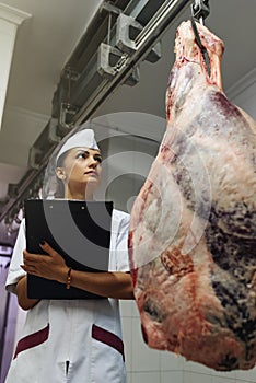 Meat quality control in butchery.