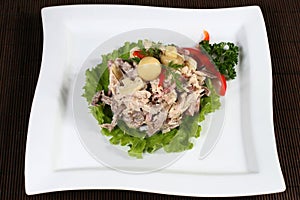 Meat salad with mushrooms and greens