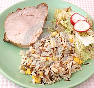 Meat with salad and rice