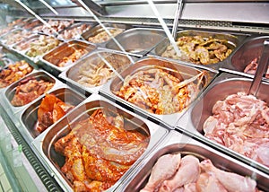 Meat showcase in food supermarket
