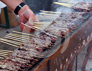 meat skewers called ARROSTICINI cooked on burning embers photo