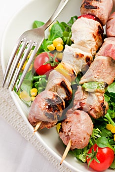 Meat Skewers on white table