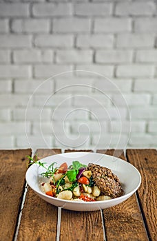 Meat steak with dumpling, pasta