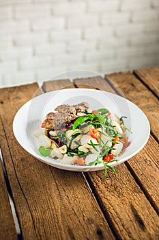 Meat steak with dumpling, pasta