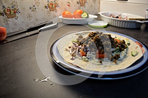 Meat taco dinner plate on kitchen table