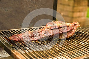 Meat and vegetable exhibition on a barbecue known as Parrilla. T photo