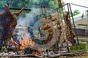 Meat and vegetable exhibition on a barbecue known as Parrilla. Typical barbecue from the south of Latin America photo