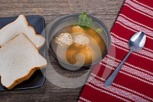 Meatball soup with bread