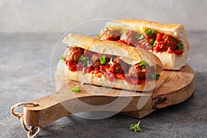 Meatball sub sandwich with cheese and marinara tomato sauce. american italian fast food