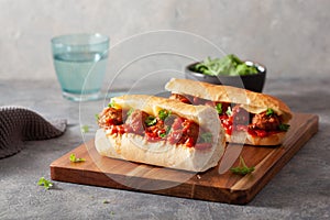 Meatball sub sandwich with cheese and marinara tomato sauce. american italian fast food