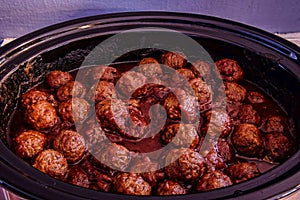 Meatballs in Crock Pot Slow Cooker Close up photo