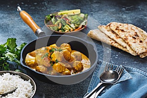 Meatballs in fragrant Indian curry sauce