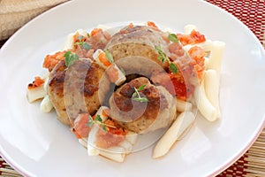 Meatballs with pasta and tomato sauce