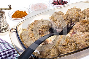 Meatballs with rice in glass baked