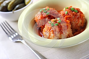 Meatballs with rice and tomato sauce