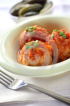 Meatballs with rice and tomato sauce