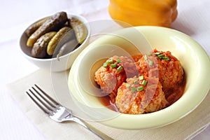 Meatballs with rice and tomato sauce