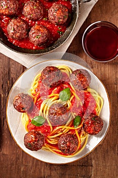 Meatballs with spaghetti and tomato sauce, shot from the top