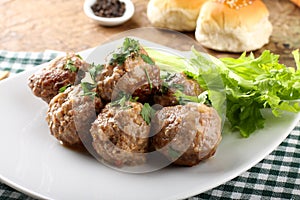 Meatballs stewed with vegetables