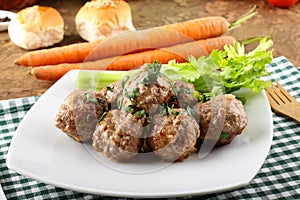 Meatballs stewed with vegetables