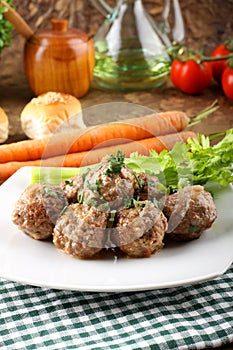 Meatballs stewed with vegetables