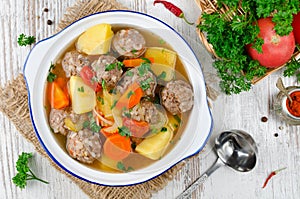 Meatballs in a thick vegetable soup Albondigas photo