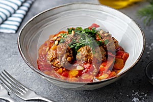 Meatballs with vegetables and tomato sauce