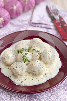 Meatballs in white sauce photo