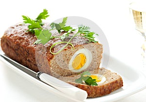 Meatloaf with boiled eggs